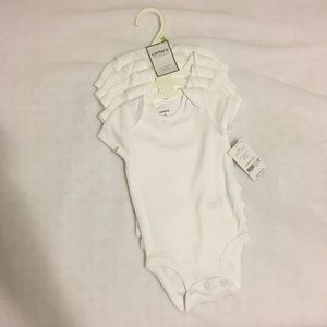 3M white onesies/bodysuits by carters